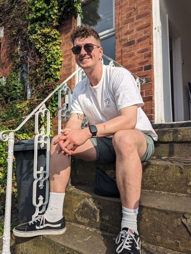 Jordan sitting on front steps